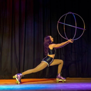 Kiki performing with huluhoops in roller skates using our flash lightning ceramic bearings